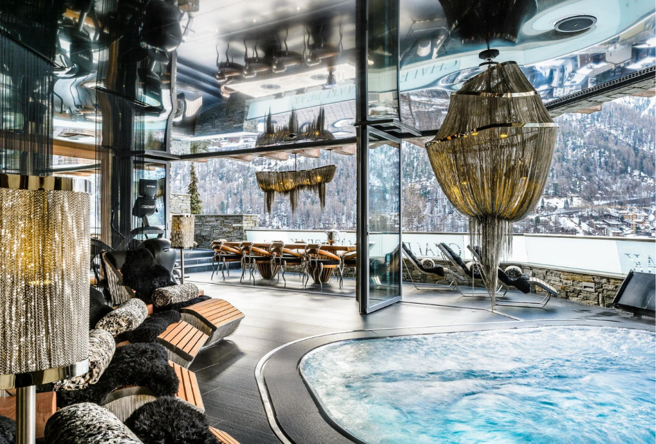 Luxury indoor pool of Chalet Zermatt Peak with views of the Matterhorn for your party holiday in the mountains