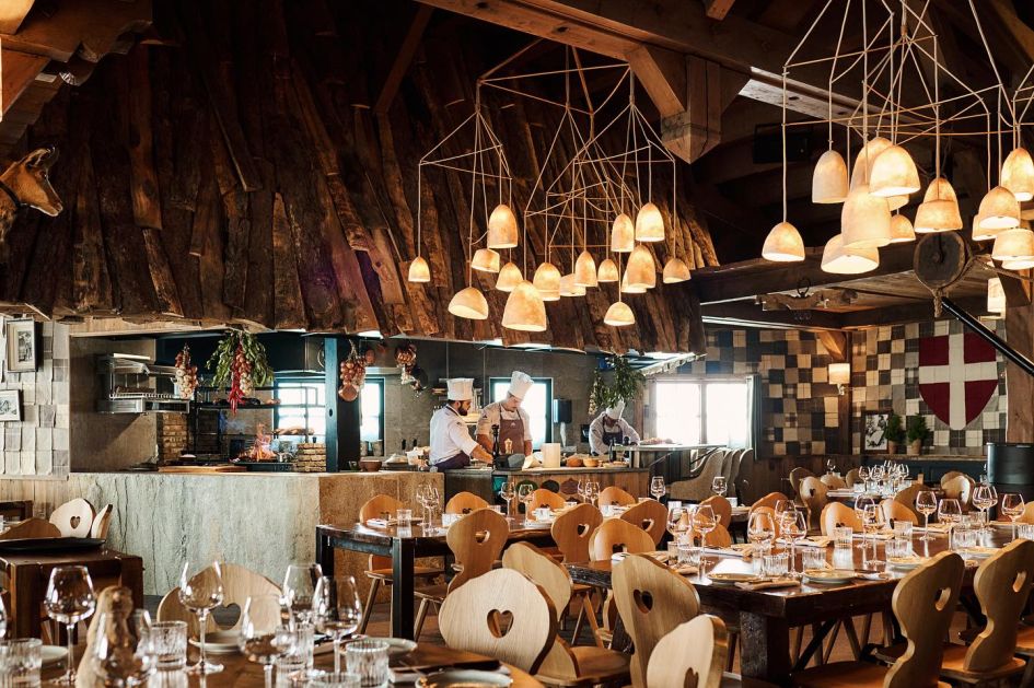 The Savoyard interiors of Le Panoramic, a restaurant in Tignes situated on the Grande Motte glacier.