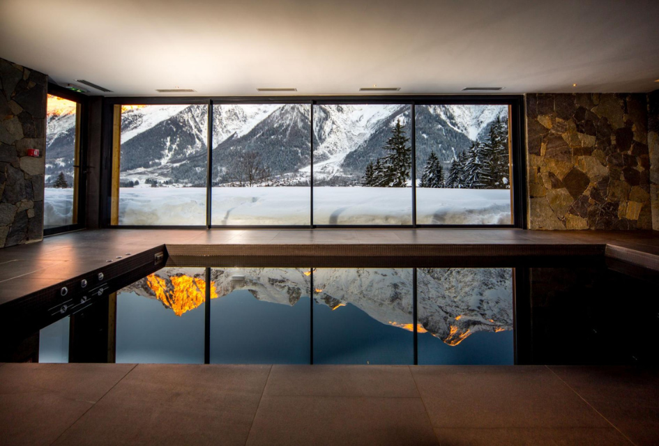 Indoor Pool with stunning mountain views at Le Chalet Mont Blanc, Chamonix, ideal to relax in on a corporate ski holiday